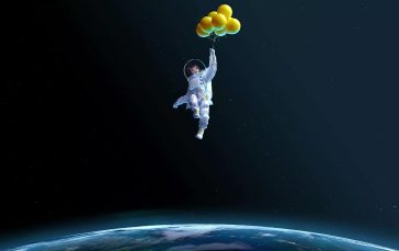 Astronaut-Holding-Balloons-Thumb