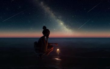 Girl-holding-sparkler-on-the-beach-thumb